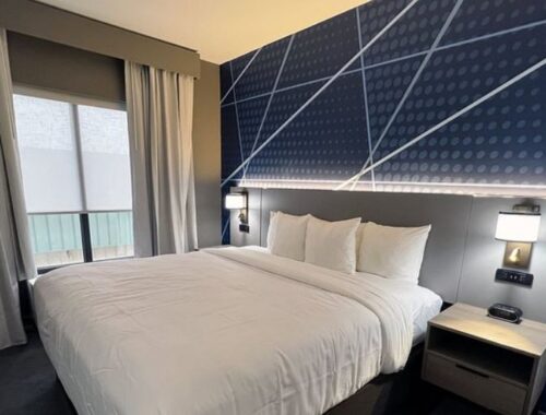 comfort inn hotel with window drapery and bedding